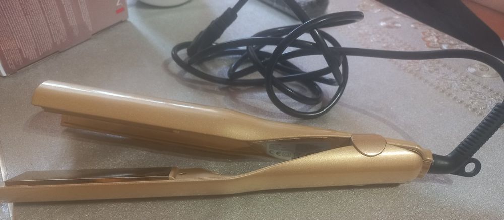 Маша в гаранция /преса/за къдрици