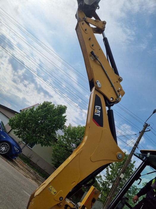 De vinzare sau inchiriat Buldoexcavator