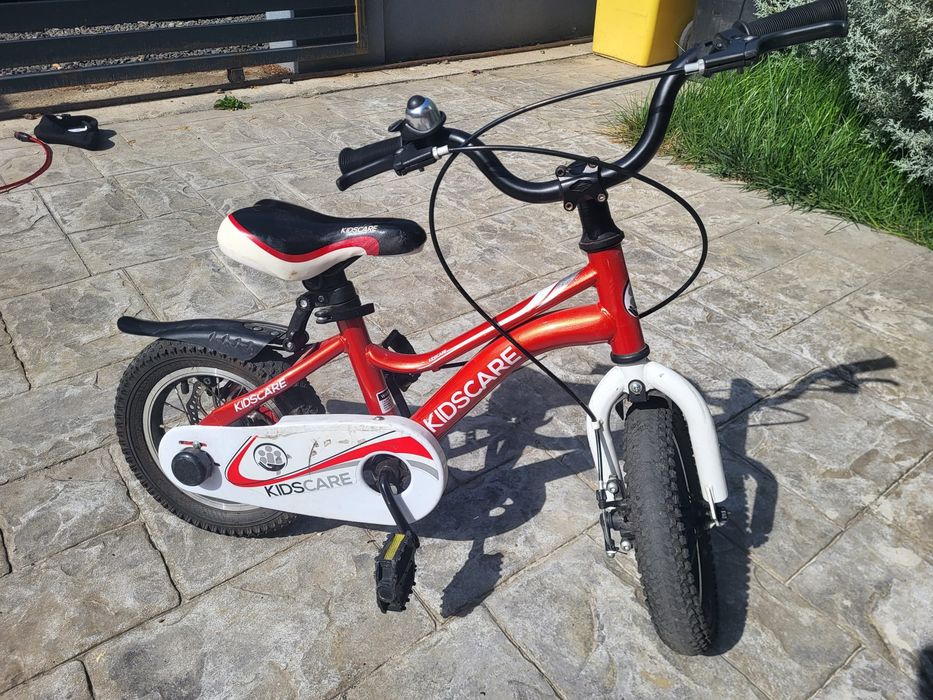 Bicicletă copii Kidscare 12 inch – stare foarte bună + roți ajutătoare