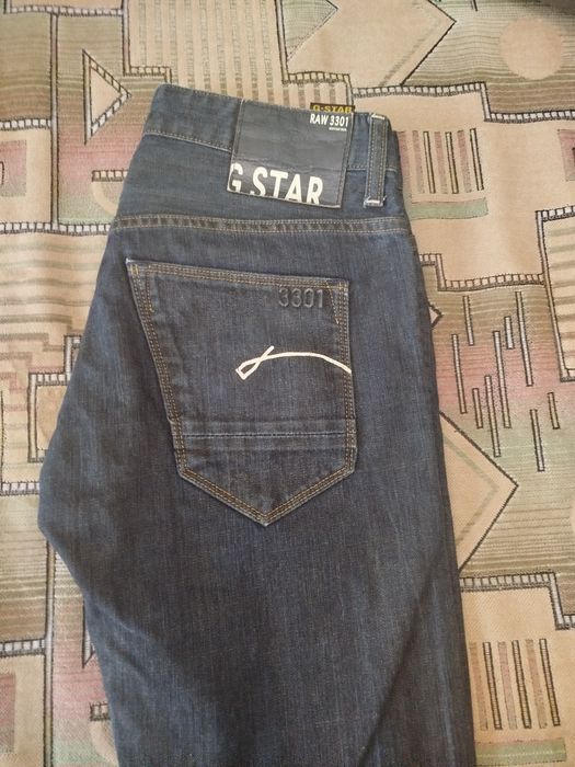 Фирменные джинсы