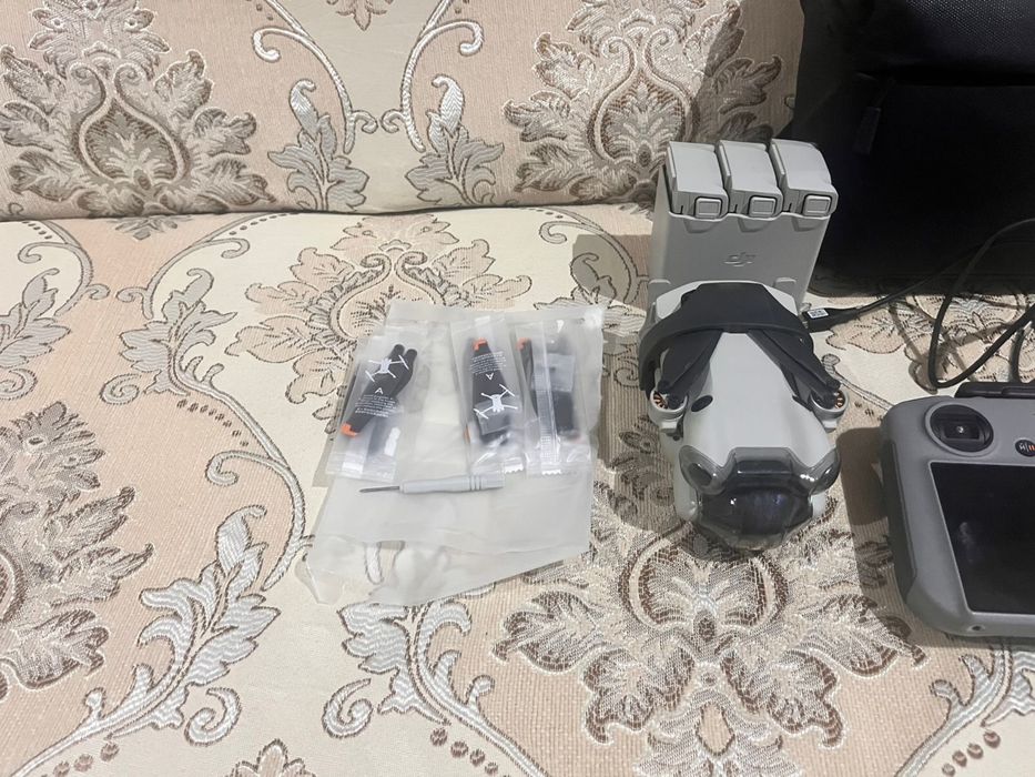 Дрон DJI Mini 4 Pro Fly More Combo Plus (DJI RC 2) белый