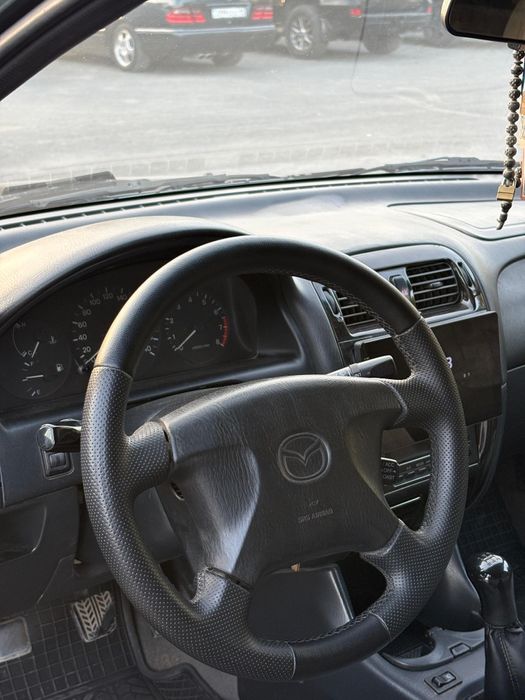 Мазда 626 птичка