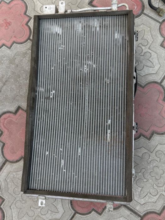 Родиатор на гранту с кондером вместе