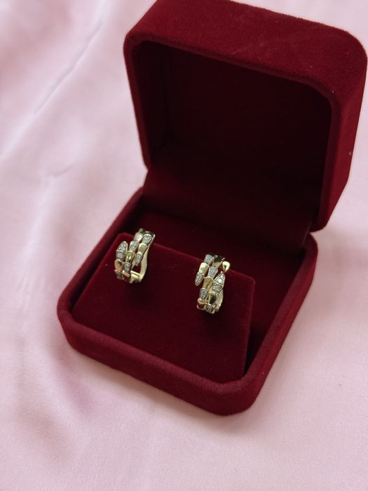 Золотые серьги змейка