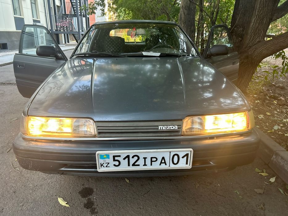 Машина Mazda 626