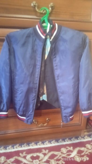 Детский сифатли ва модний Ветрофка тезда сотилади кўк рангда