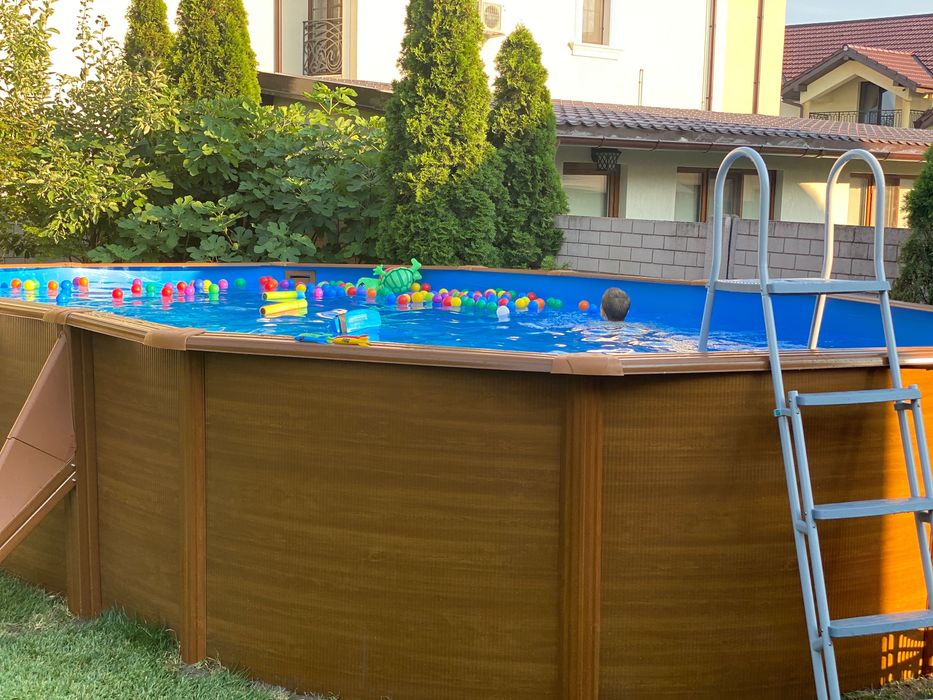 Piscina supraterana Gre Pacific ovala cu pereti metalici imitatie de lemn 730 x 375 h 120cm