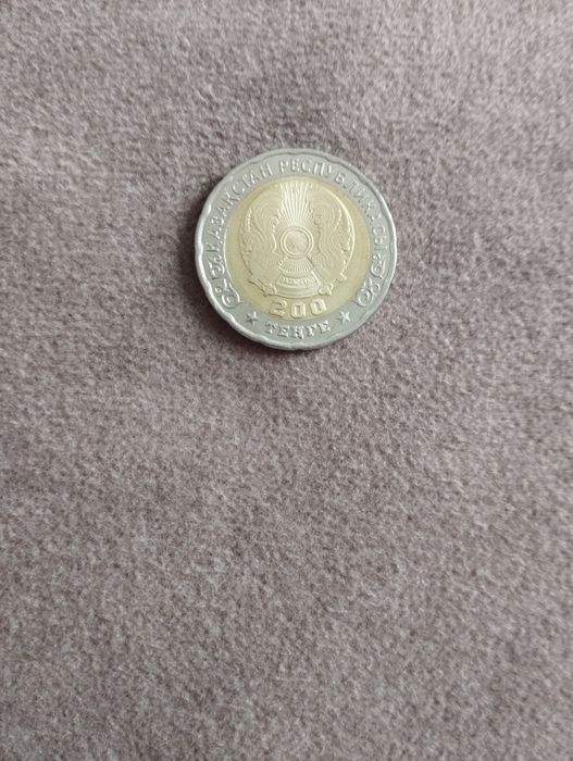 Продам монету 200 тенге 80 лет