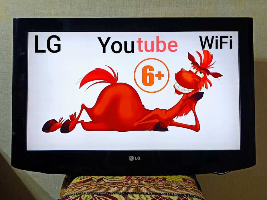 Телевизор LG , голосовой пульт .