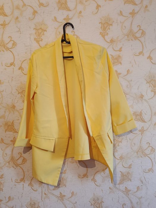 Женские одежды..