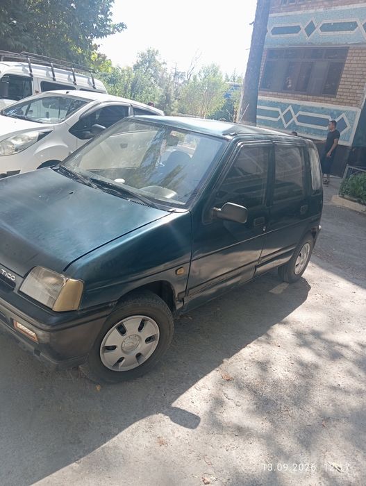 Tiko 1997yil binzin