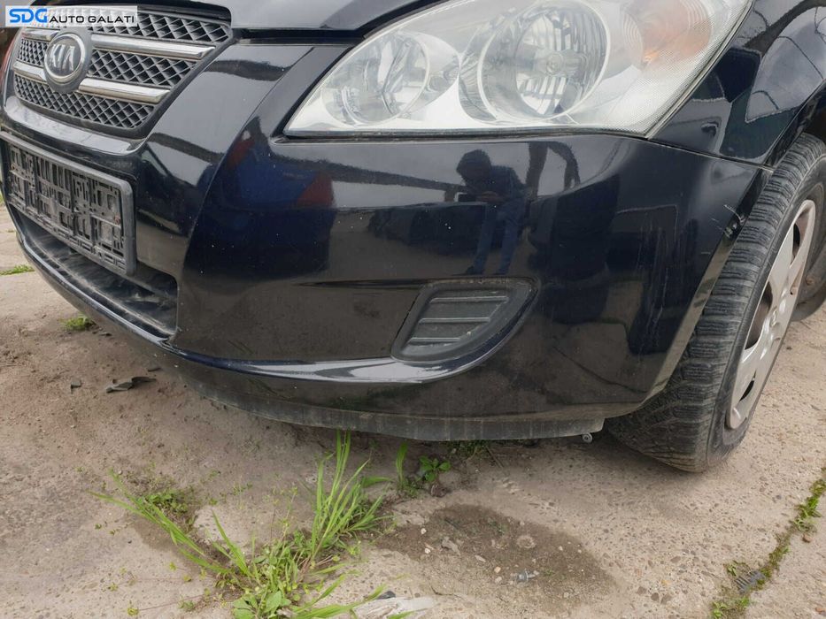 Bara Spoiler Fata Completa cu Grile Fara Grila cu Emblema cu Imperfectiuni Kia Ceed 2007 - 2010 Culoare 1K Black Pearl [Z0087]