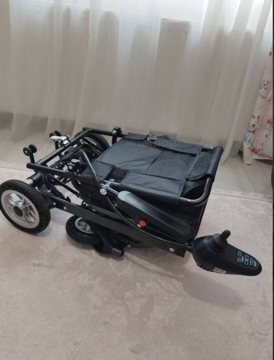 Помощна количка с електрически мотори  за трудноподвижни