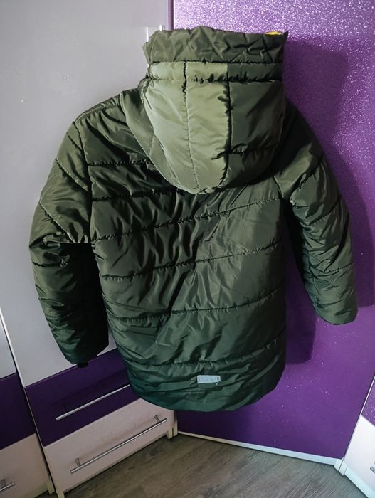Продам зимний пуховик на мальчика,7-9 лет