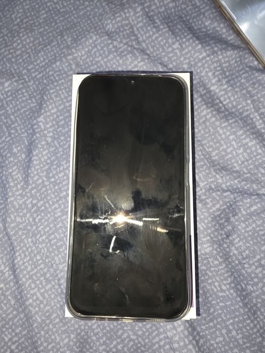 Vind  telefon REDMI 15C