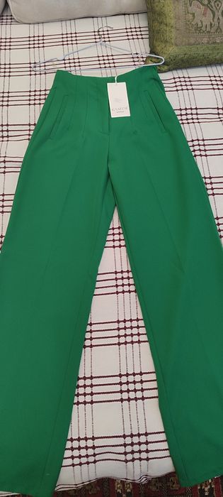 Продам брюки новые