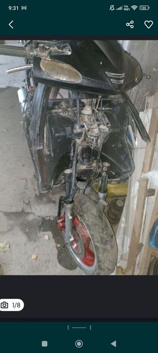 Продается скутер 150 кубовый смотрите фото.