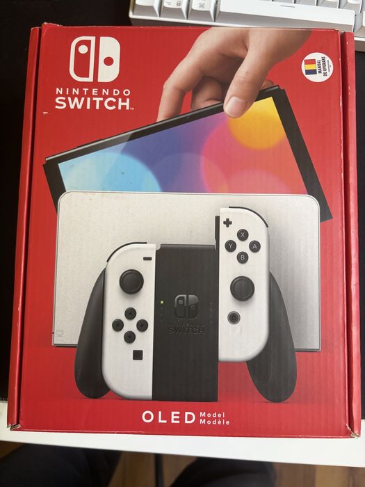 Nintendo swich oled ca nou +3 jocuri Mario si un set joyconuri in plus