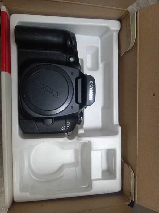 Продам пленочную зеркальную фото камеру Canon EOS 33 (Made in Japan)