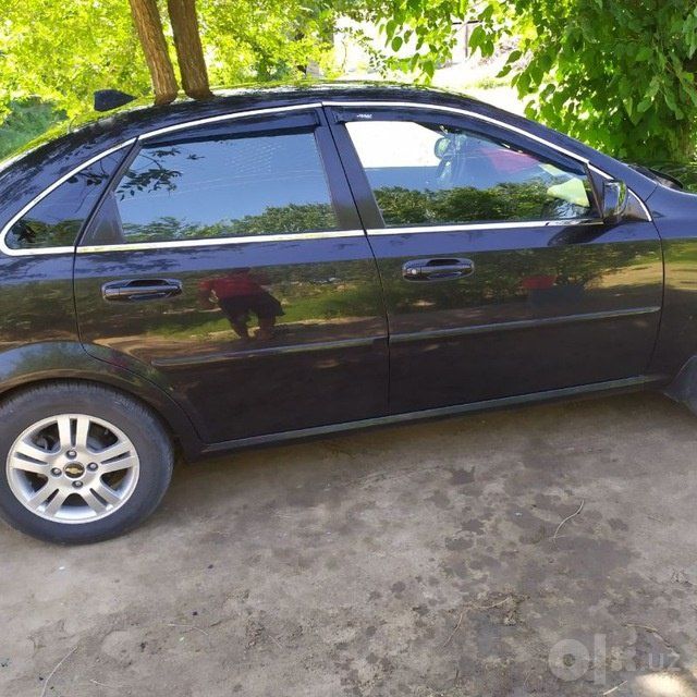 Lasetti 1.8 2012 holati alo