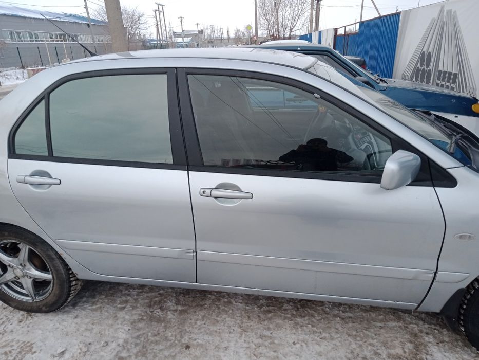 Мицубиси Лансер 9