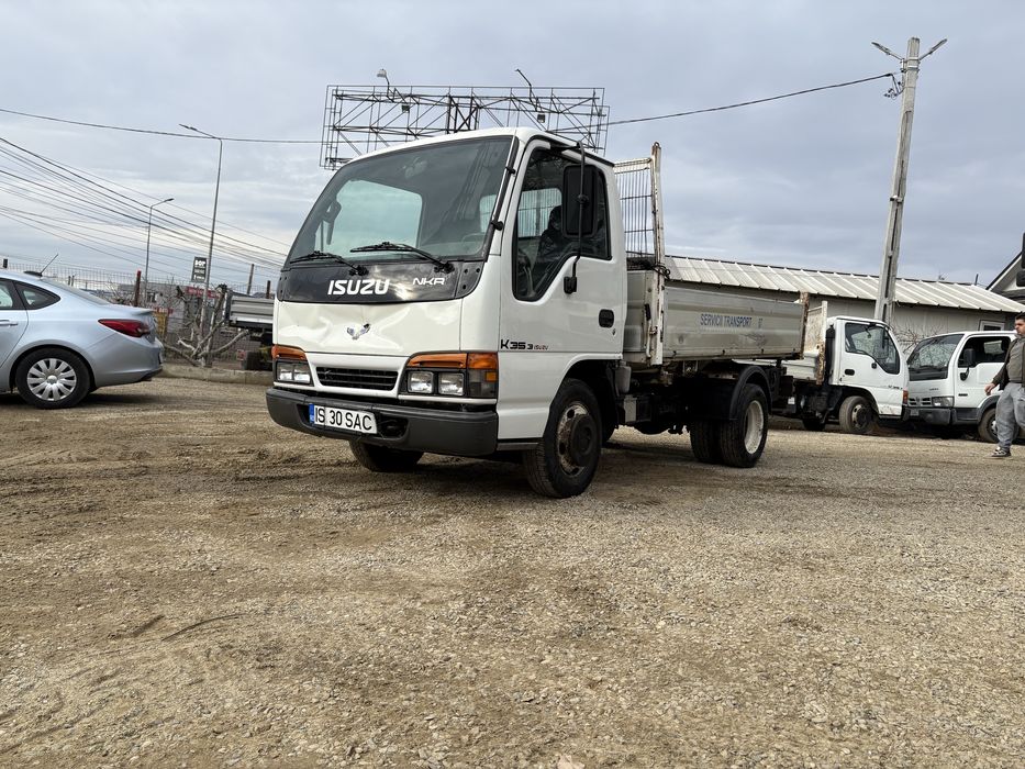 Isuzu basculabil pe 3 parti cu basculate pe hartie