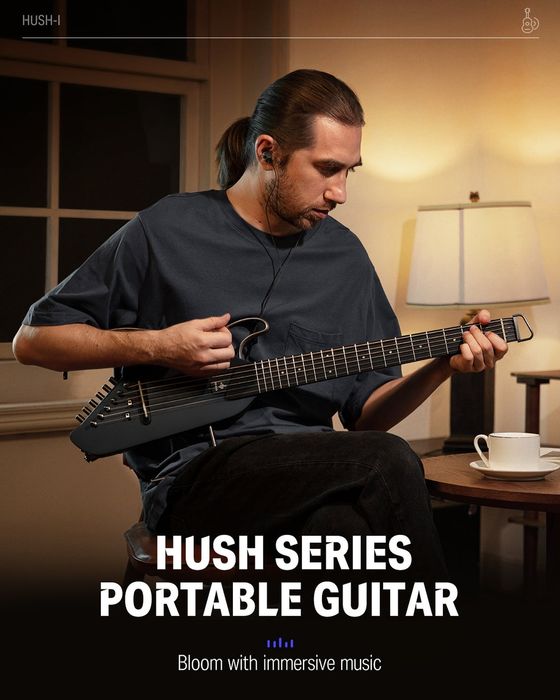 Chitară electro-acustică Donner HUSH I de călătorie.