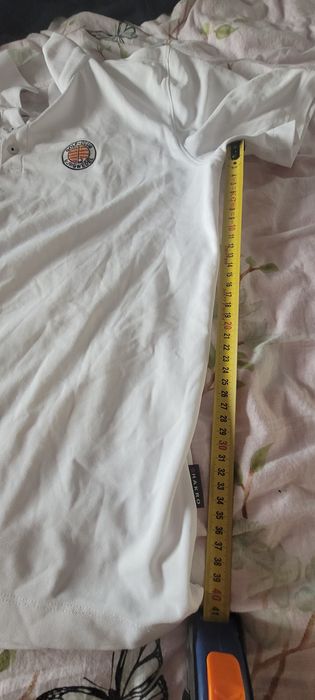 Tricou golf alb..