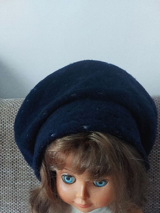 Bereta calduroasa de lana cu captuseala plusata