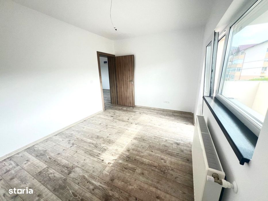 Apartament nou,INTABULAT, 95 000 euro cu loc de parcare inclus, Bucium