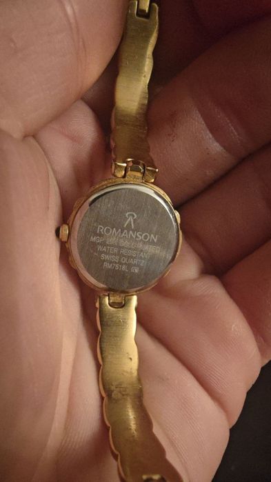 Продам женские часы Romanson