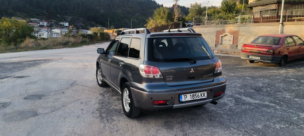 Mitsibihi outlander 2.0 136 к.с 4x4
