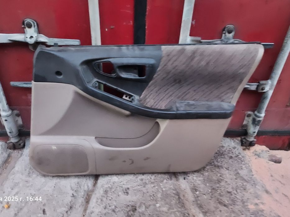 Обшивка двери Субару Форестер SF