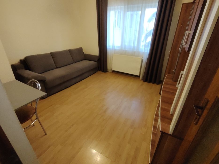 dau in chirie apartament cu 2 camere + parcare acoperita