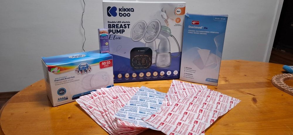 Лот двойна помпа за кърма , лепенки ,гел за зърна и тампони