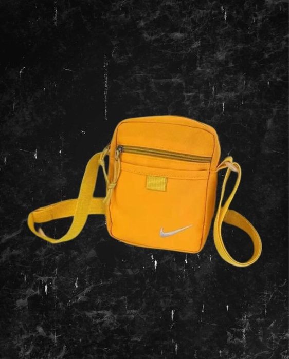 барсетки Nike.