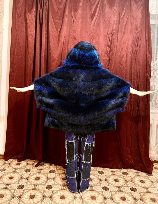 Продам Енотовый полушубок