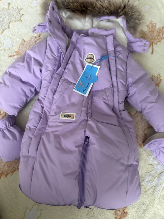 Продам новый качественный зимний комбинизон, рост 80см.