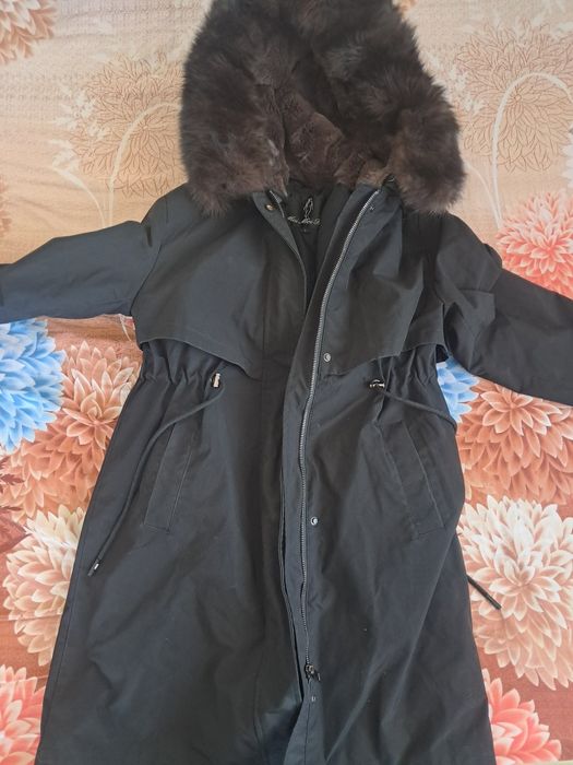 Продам женский пуховик