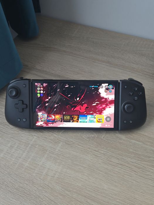 Nintendo Switch OLED Modat 512 gb + 74 Jocuri + Mobapad M6 HD – Stare excelentă