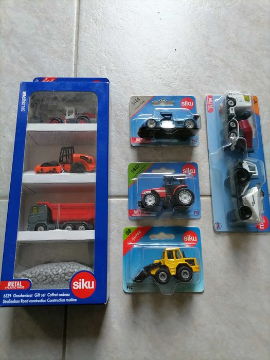 Mașinuțe siku  lot de 50buc.+set de parcare