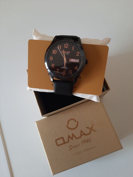 Кварцевые часы оmax