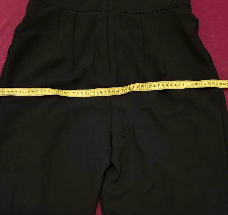 Pantaloni largi cu talie inalta