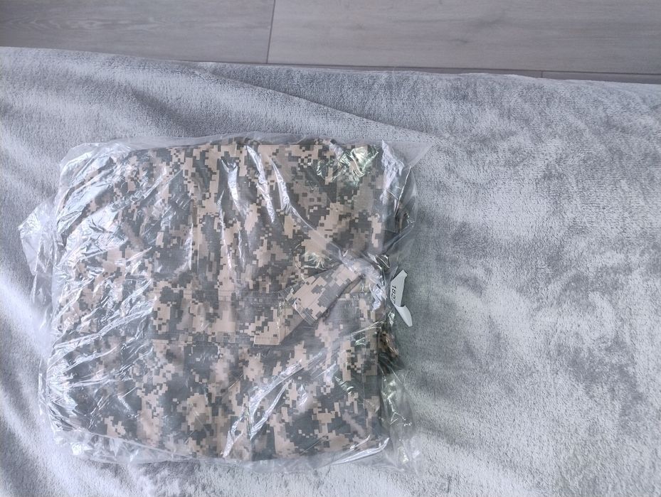 Камуфлажни дрехи