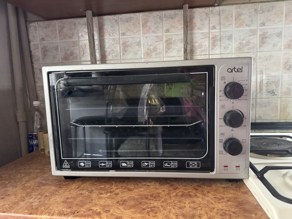 Продам мини электропечь Artel
