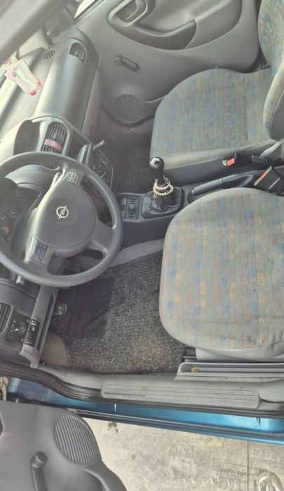 Opel corsa- 1.0 benzina- trapa-2003