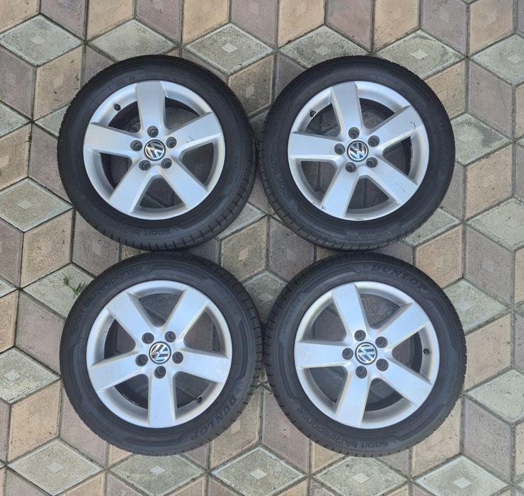 Jante Aliaj Originale VW R16 5x112 + Anvelope Vară Dunlop 205/55 R16