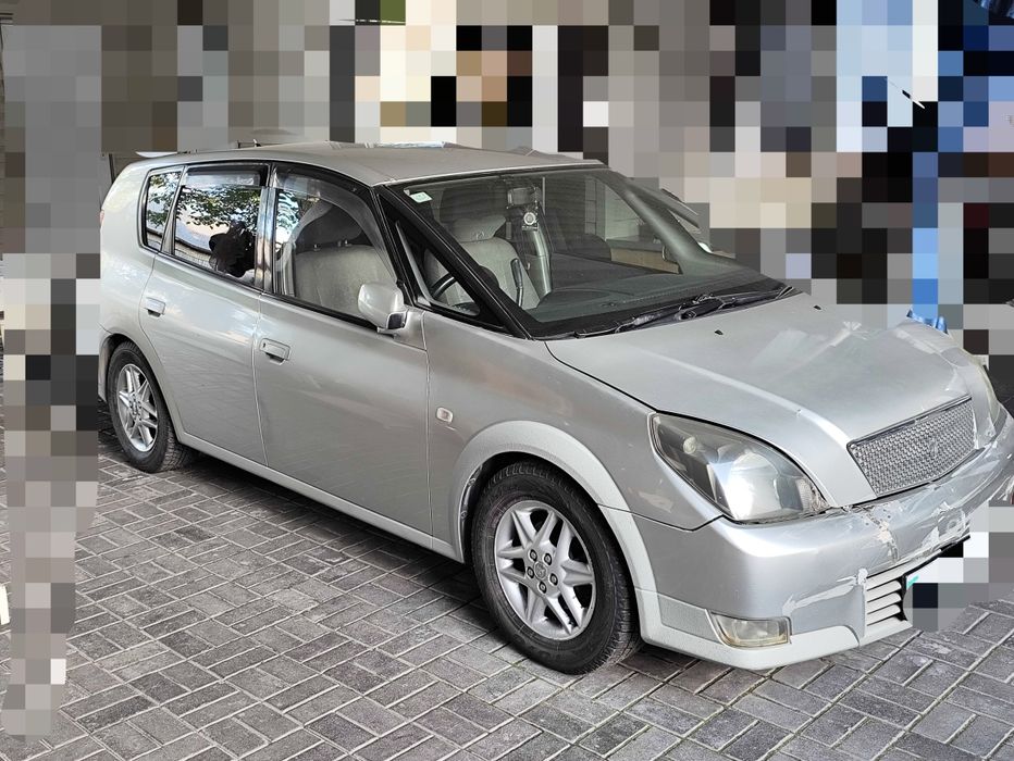 Автомобиль Toyota Opa