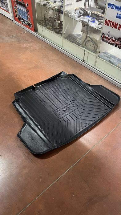 Полик в багажник Оникс