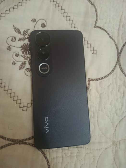 Vivo V50 Lite телефон
